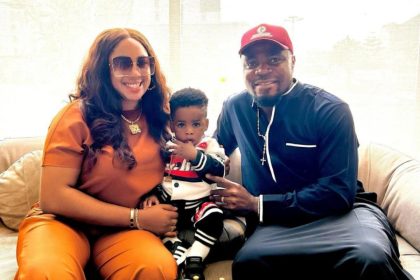 Amarachi Igidimbah and Her Son Posing With Footballer Emmanuel Emenike